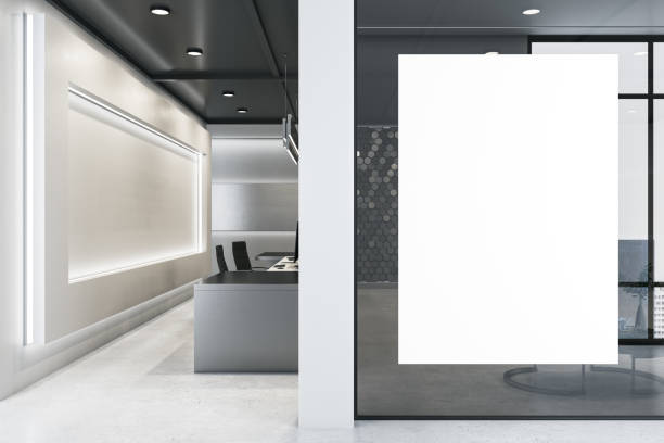 istock Modern office interior with empty poster on glass wall. Mock up, 3D Rendering. 1332541711