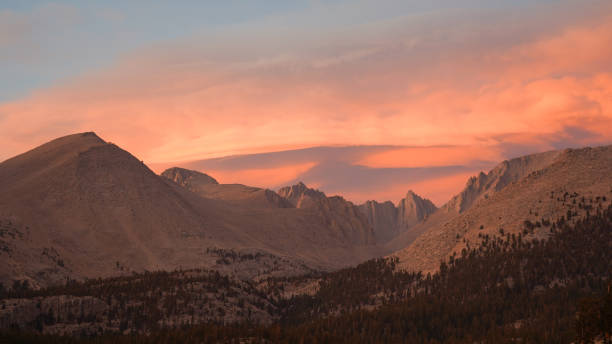 istock Sunset with dramatic clouds over Mount Whitney on the Pacific Crest Trail seen from Crabtree Meadows along the PCT California Section G from Walker Pass in the USA. 1332541802