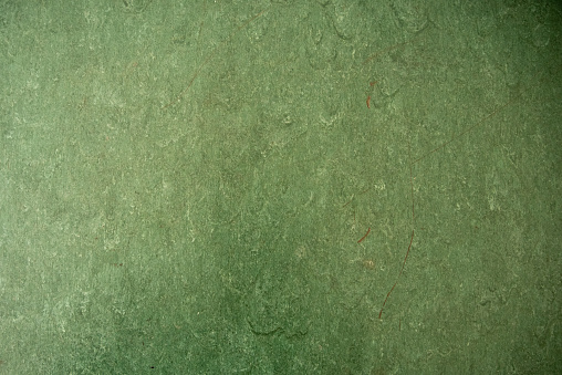 Fondo de linóleo verde como fondo o textura photo