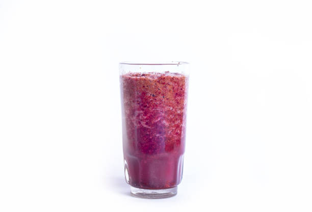 istock Glass of Red Grape Juice on a white background 1332546330