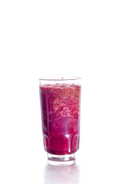 istock glass of grape juice on a white background 1332546339
