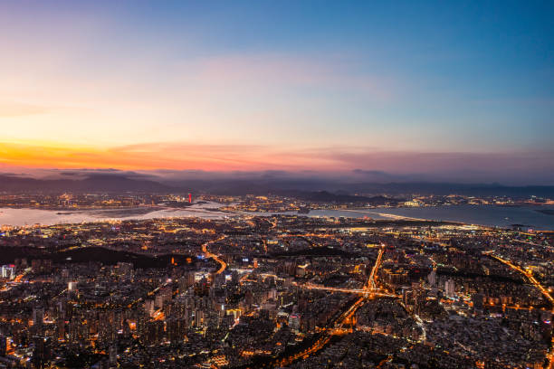 istock Universal seaside city night view lighting skyline 1332549257