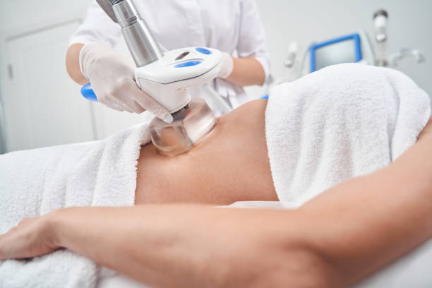 istock Woman doing anti-cellulite massage for abdomen in studio 1332550609