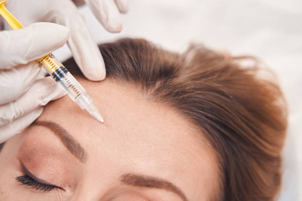 istock Young lady doing beauty injections for face 1332555180