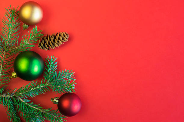 istock Christmas decoration on red background with copy space 1332556690