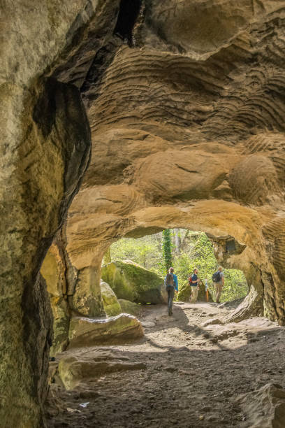 istock inside millstone cave Hohllay in the forest Mullerthal, Berdorf, Luxembourg 1332565435