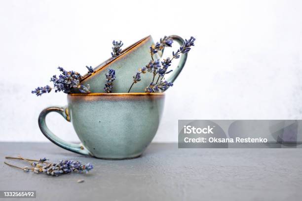 Ceramic Cups With Dry Lavender Flowers On Gray Backgroundside View Space For Text Beautiful Table Setting Stock Photo - Download Image Now