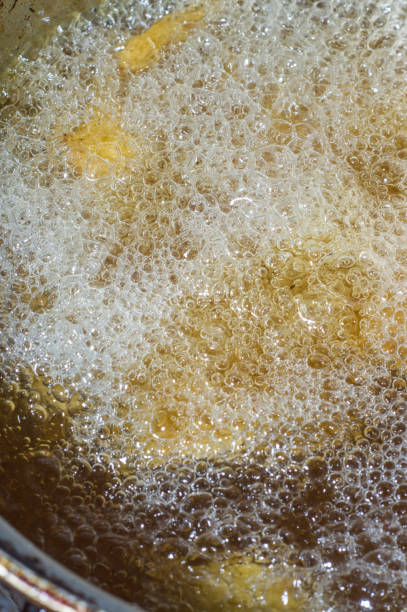 istock cassava being chilled in boiling oil and bubbling 1332566731