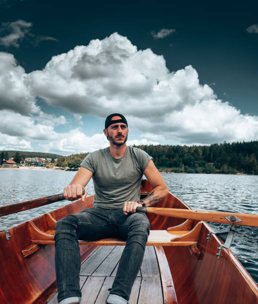 istock man rowing in the lake 1332568387
