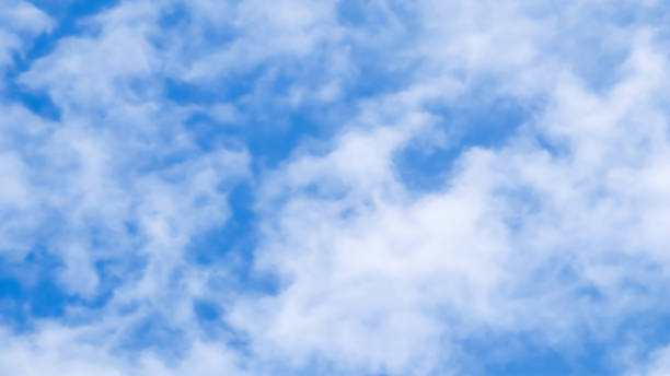 istock Background of blue sky with clouds 1332572768