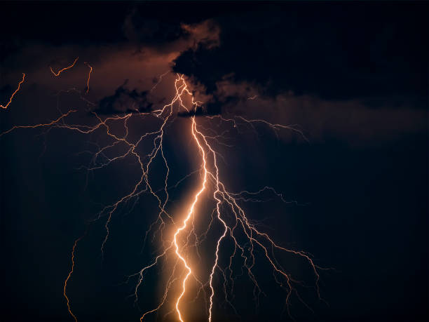 istock There are many lightning bolts against the black sky. 1332572824