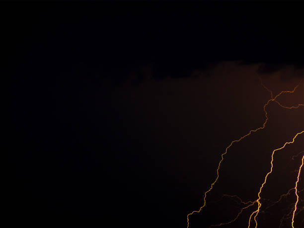 istock There are many lightning bolts against the black sky. 1332572828