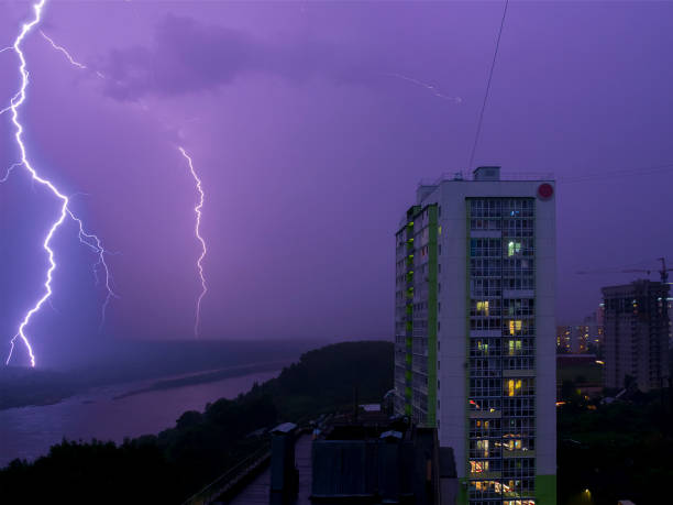 istock Storm with a thunderstorm in the night near the river. 1332572836
