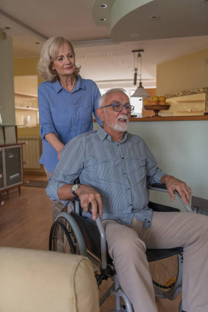 istock Disabled Man is Enjoying the Time with his Wife While at Home. 1332578518