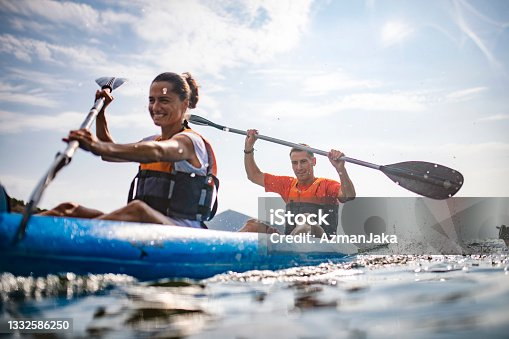 istock Action Portrait of Spanish Kayakers Enjoying Morning Workout 1332586250