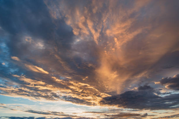 Amazing cloudscape on the sky at sunset time after rain.