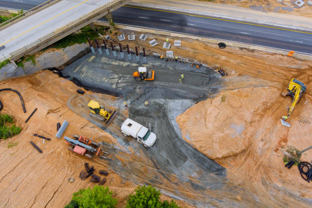 istock Construction for renewing pillars bridge of a under renovation road modern road interchange in US 1332595714