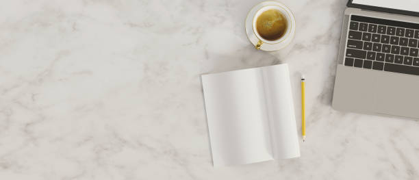 istock Top view, Marble background, marble top table with laptop, blank notebook, coffee 1332601304