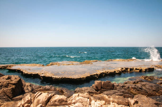 istock Nice cave with rock on the beach southern Vietnam 1332606264