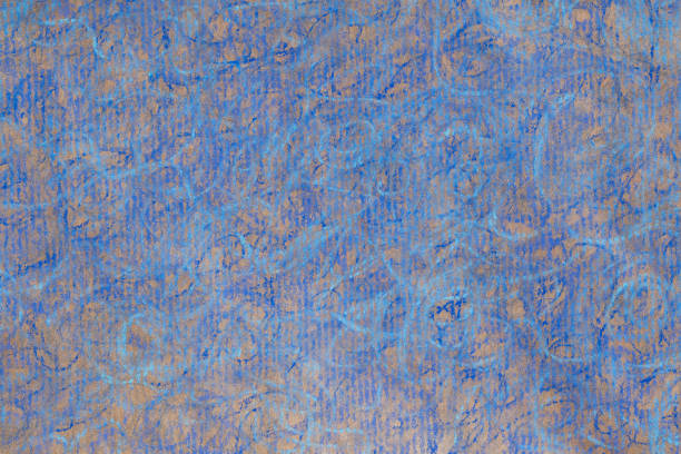 istock blue crayon doodles on recycled paper background texture 1332610827