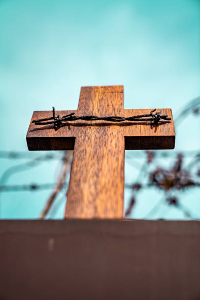 istock Blue Sky Background Torture Tree Cross 1332611831