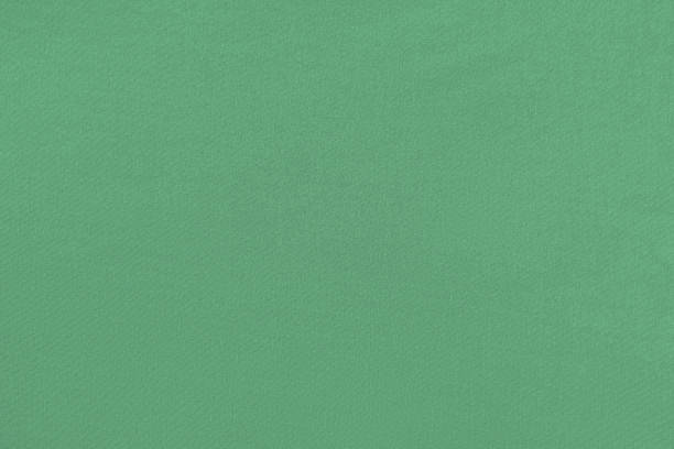 istock Green homogeneous background with a textured surface 1332612563