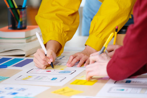 istock Brainstorm planing creative teamwork,  Close up of hands mobile phone app developer team meeting about screen display prototype layout for smartphone, ui, ux concept 1332612572