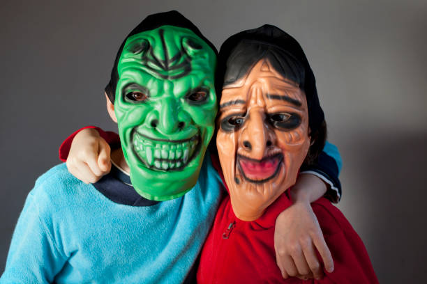 Boy in Venetian mask.