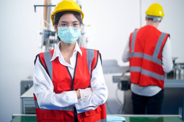 istock Quality control (QC) engineer monitoring and checking machine system in manufacturing factory 1332622357