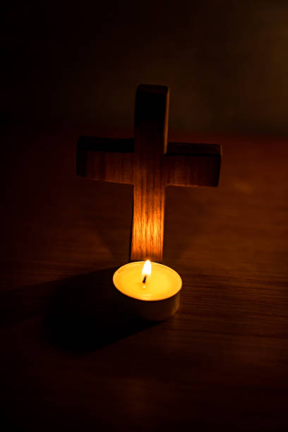 istock Candles and crossings. 1332626674
