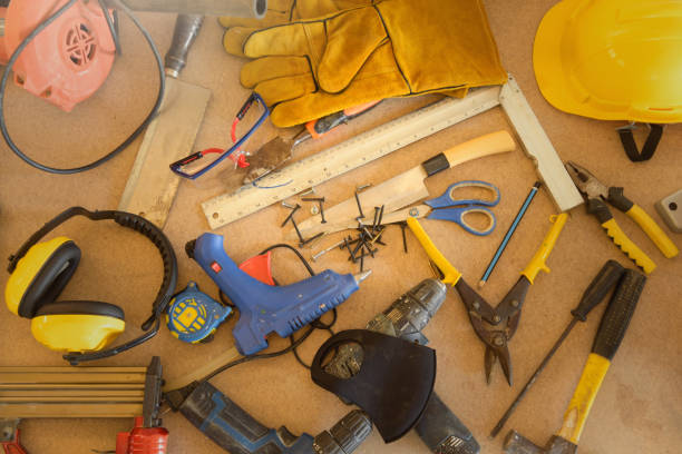 A desk of contractor engineers.collection of working tools on a workbench,Carpenter tools \