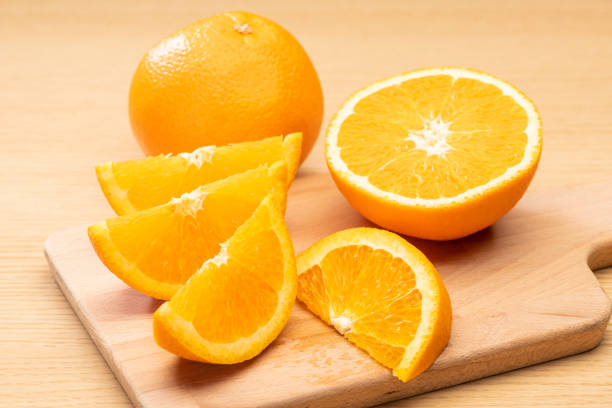 istock Close-up shot of cut fresh orange 1332631664