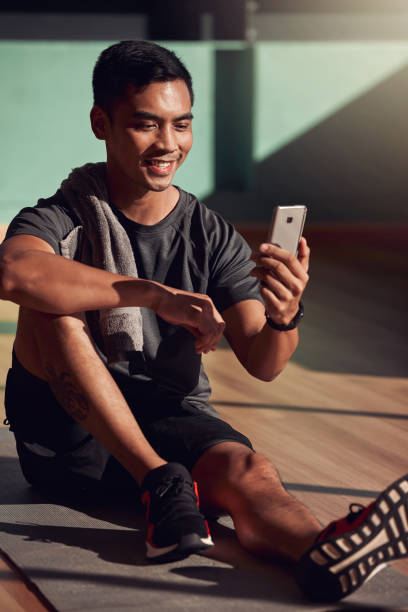 istock Shot of a young using his smartphone to send a text 1332633498