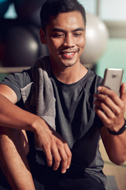 istock Shot of a young using his smartphone to send a text 1332633524