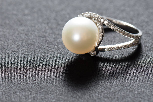 istock Ring with pearl and diamonds,silver ring with pearl and diamonds 1332633810