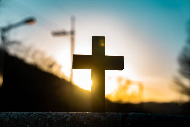 istock Sunset Background Wooden Cross 1332640771