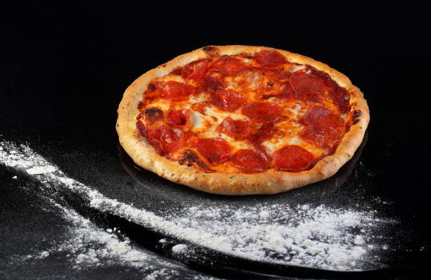 istock Pizza with mushrooms, sausage 1332641001