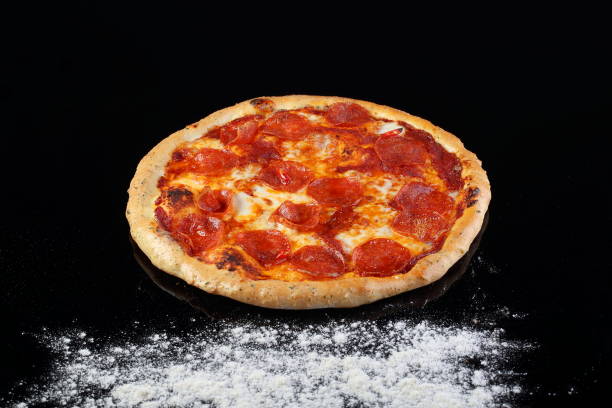istock Pizza with mushrooms, sausage 1332641010