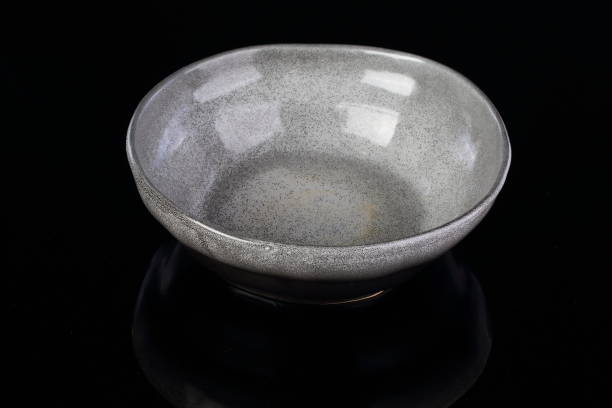 istock close up of gray ceramic plate on slate background 1332641430