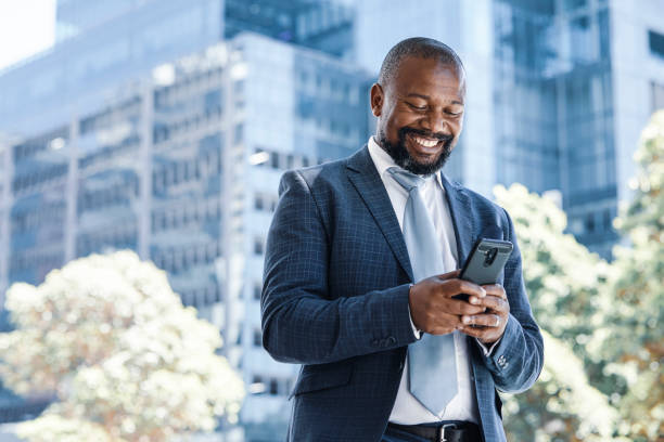 istock Handsome businessman using his phone 1332641697