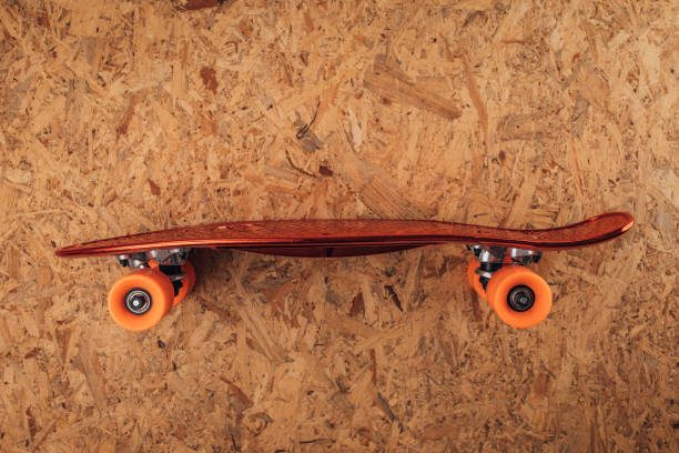 istock Skateboard on the wooden background 1332644839