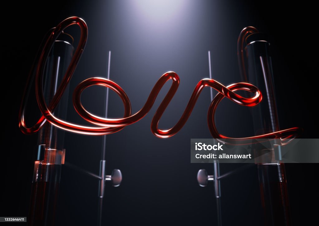 Love Chemistry Experiment A concept of a glass chemistry set with the word love spelt out in red liquid in the pipes between two spotlit pipettes on an isolated dark background - 3D render Brightly Lit Stock Photo
