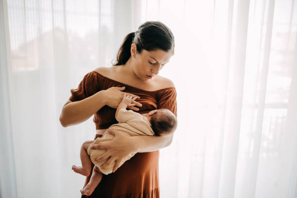 istock Mother breastfeeding her newborn son 1332652064