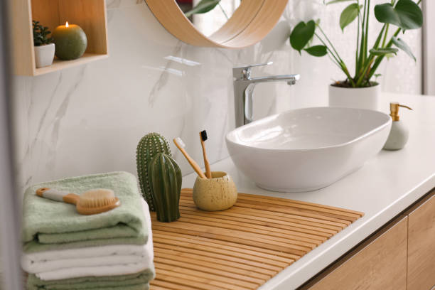 istock Stylish vessel sink on light countertop in modern bathroom 1332654758