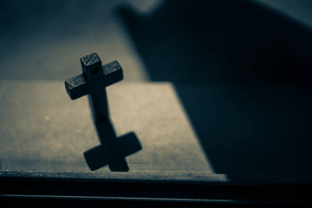 A dark wooden cross.