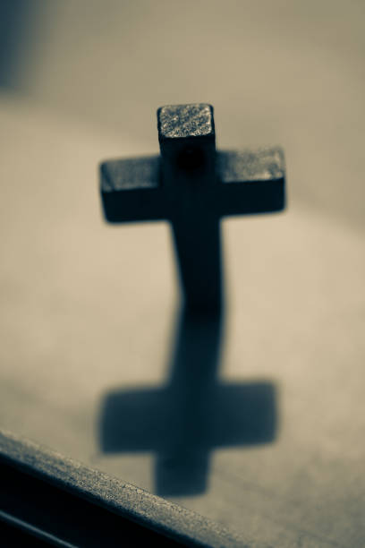 istock A dark wooden cross. 1332659173