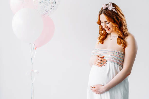 istock pregnancy model shooting happy woman expecting 1332659366