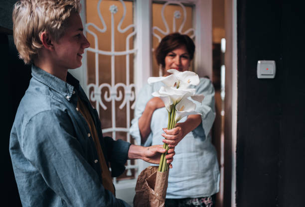 istock A young man visiting his mother 1332660419