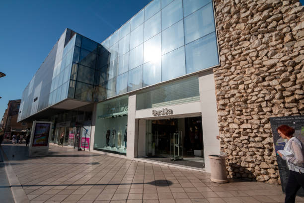 Bershka in Split, Croatia. This is a Spanish clothing retailer.  Tourists can be seen walking past.