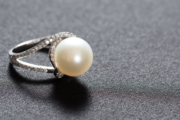 istock Ring with pearl and diamonds,silver ring with pearl and diamonds 1332669708